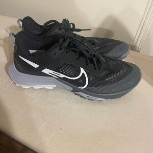 Nike Black and Gray Trail Running Shoes with White Swoosh